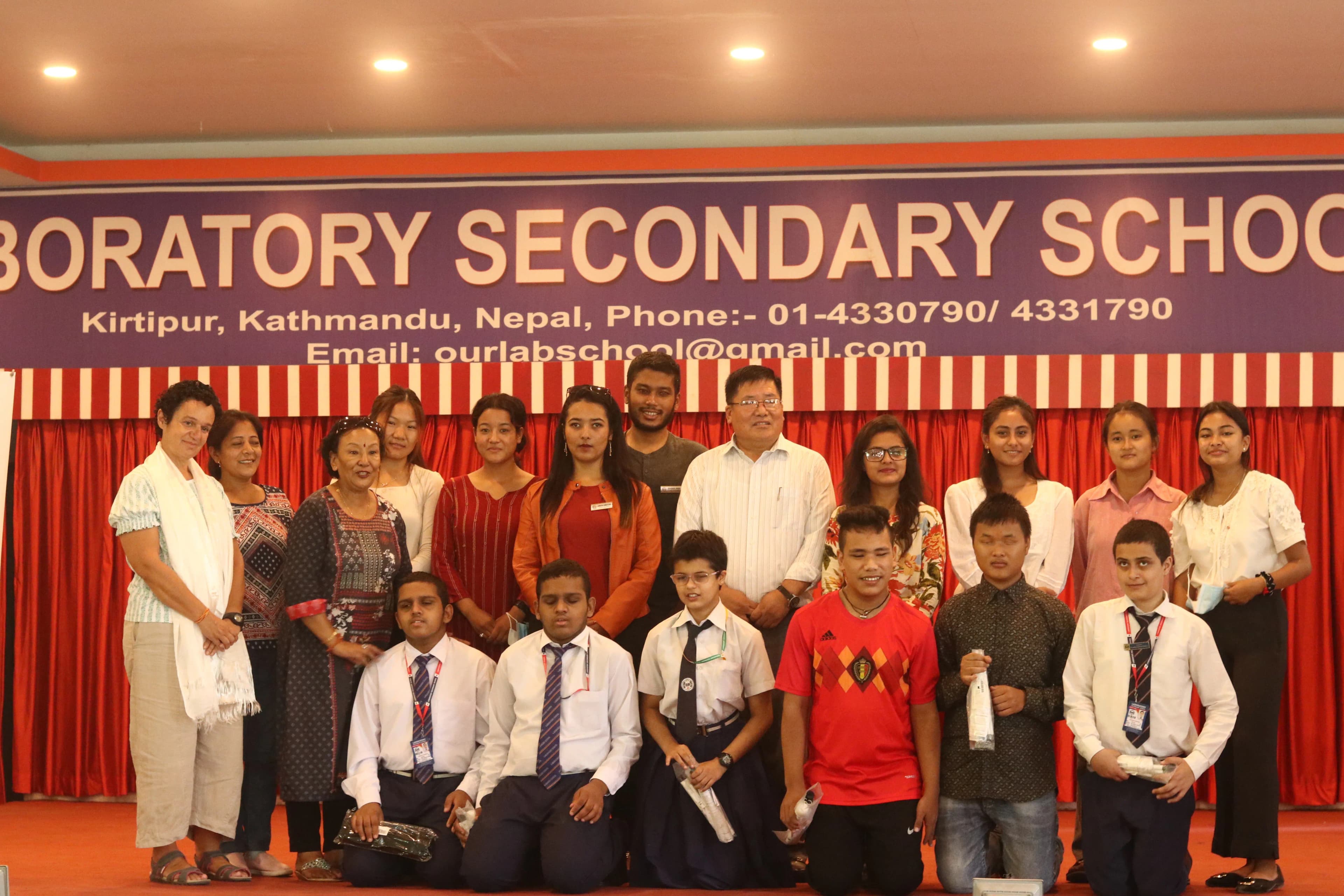 Group picture during the 1st day of Guiding Techniques & Mobility Skills Training – 2022 of participants with visual disabilities, their guides, Dr. Lakpa Sherpa – the principal and teachers of Laboratory School, Fanny Collado – President of Expadición Solidaria and organizational members of CFC.
