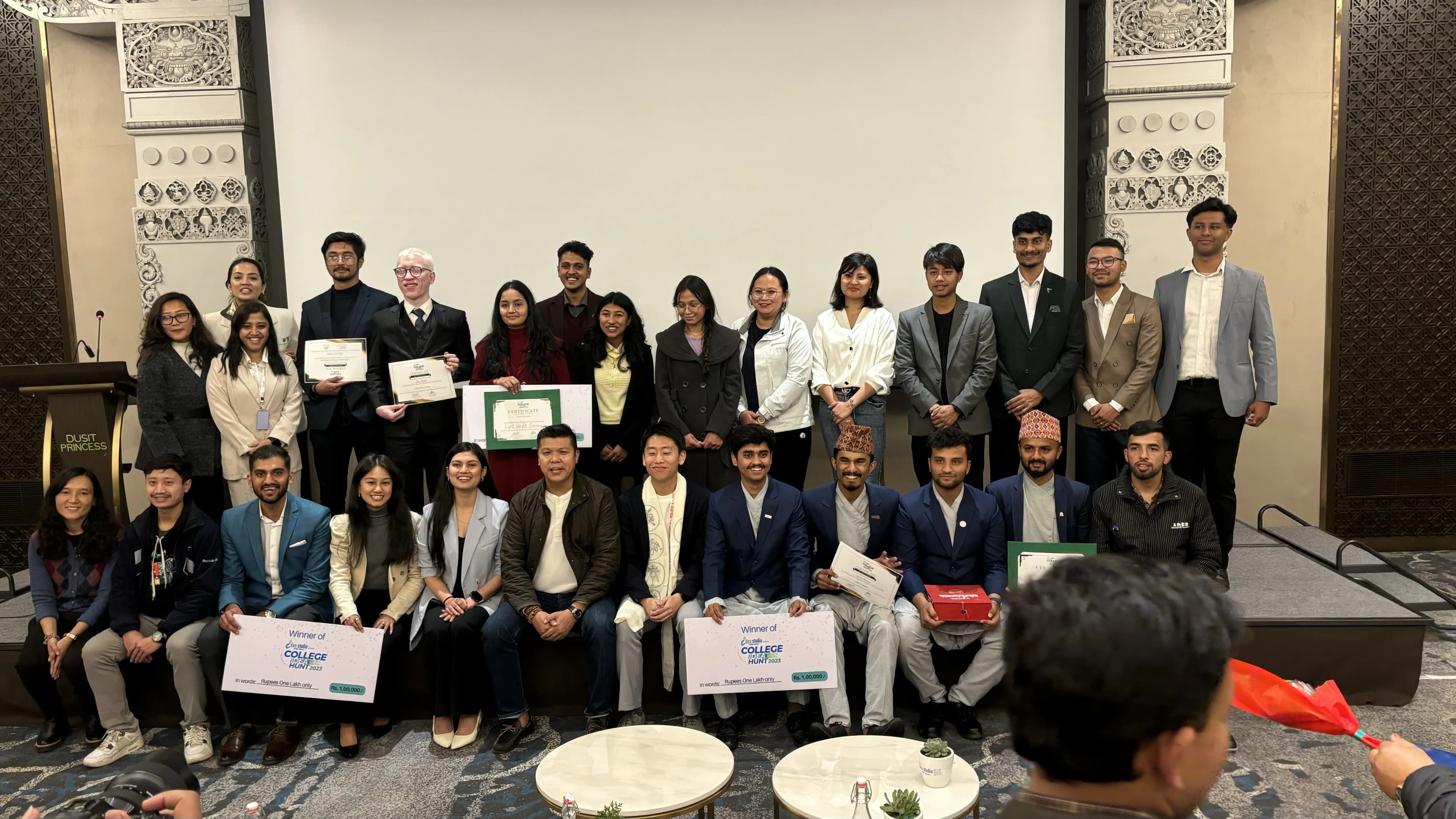 Group picture which consist of around 20 individuals including top 10 participants, event guests and organizers.