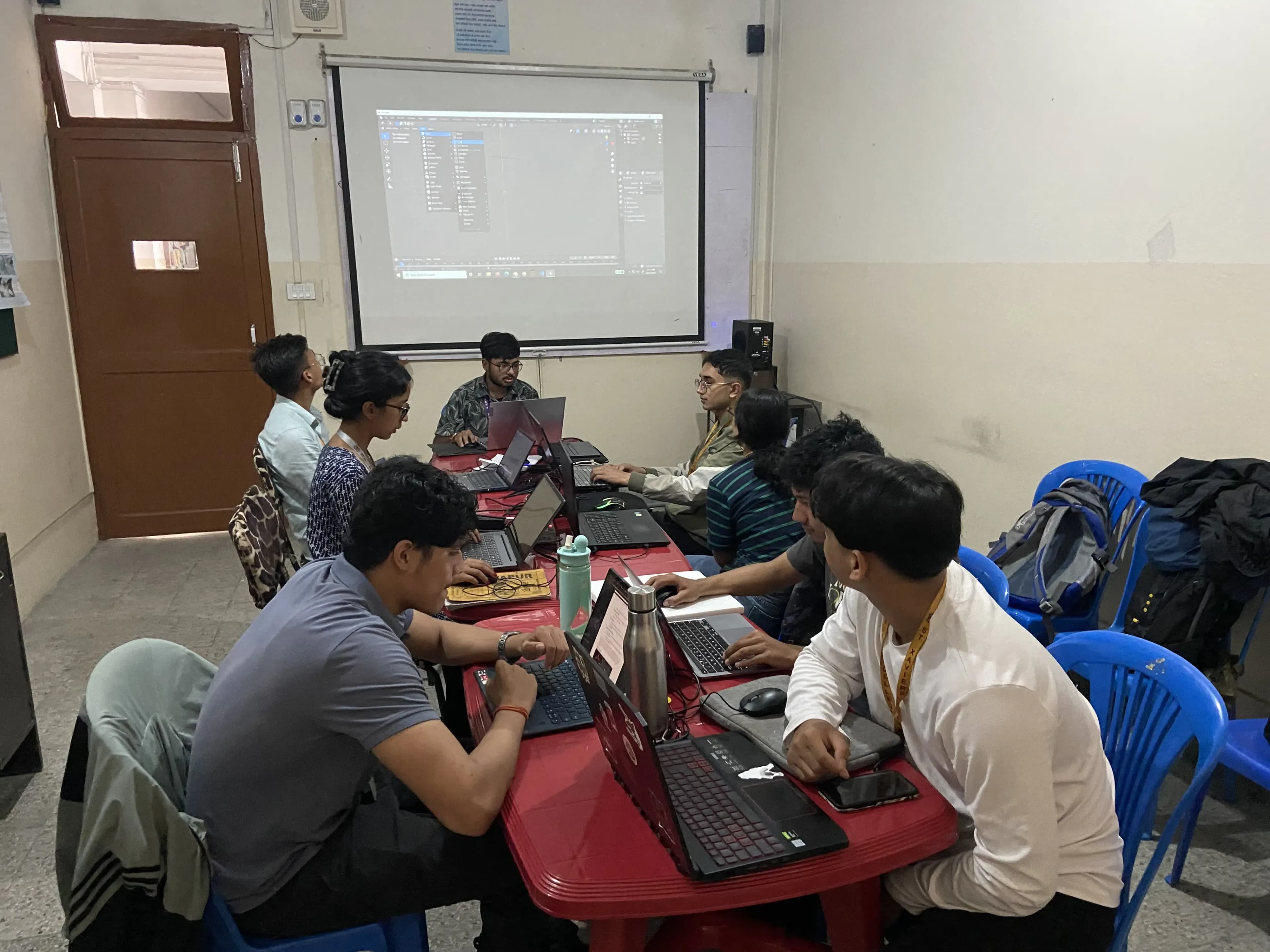 One of our volunteer Sashwot Mishra is guiding and instructing around 7 new project members from computer team to use 3D designing software.