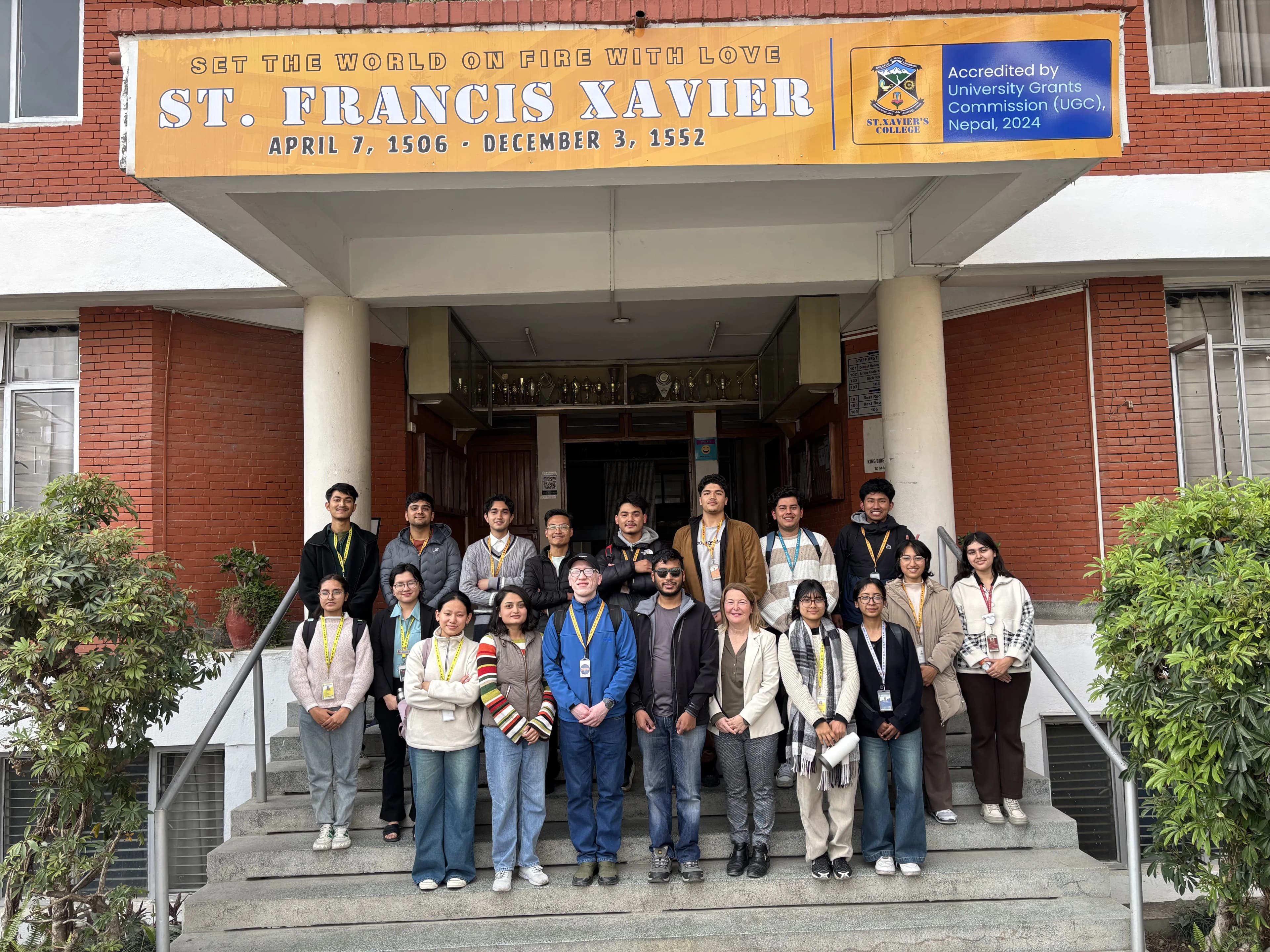 A group picture of 19 individuals consisting of project members, exchange staff, officers, and executives of CFC.