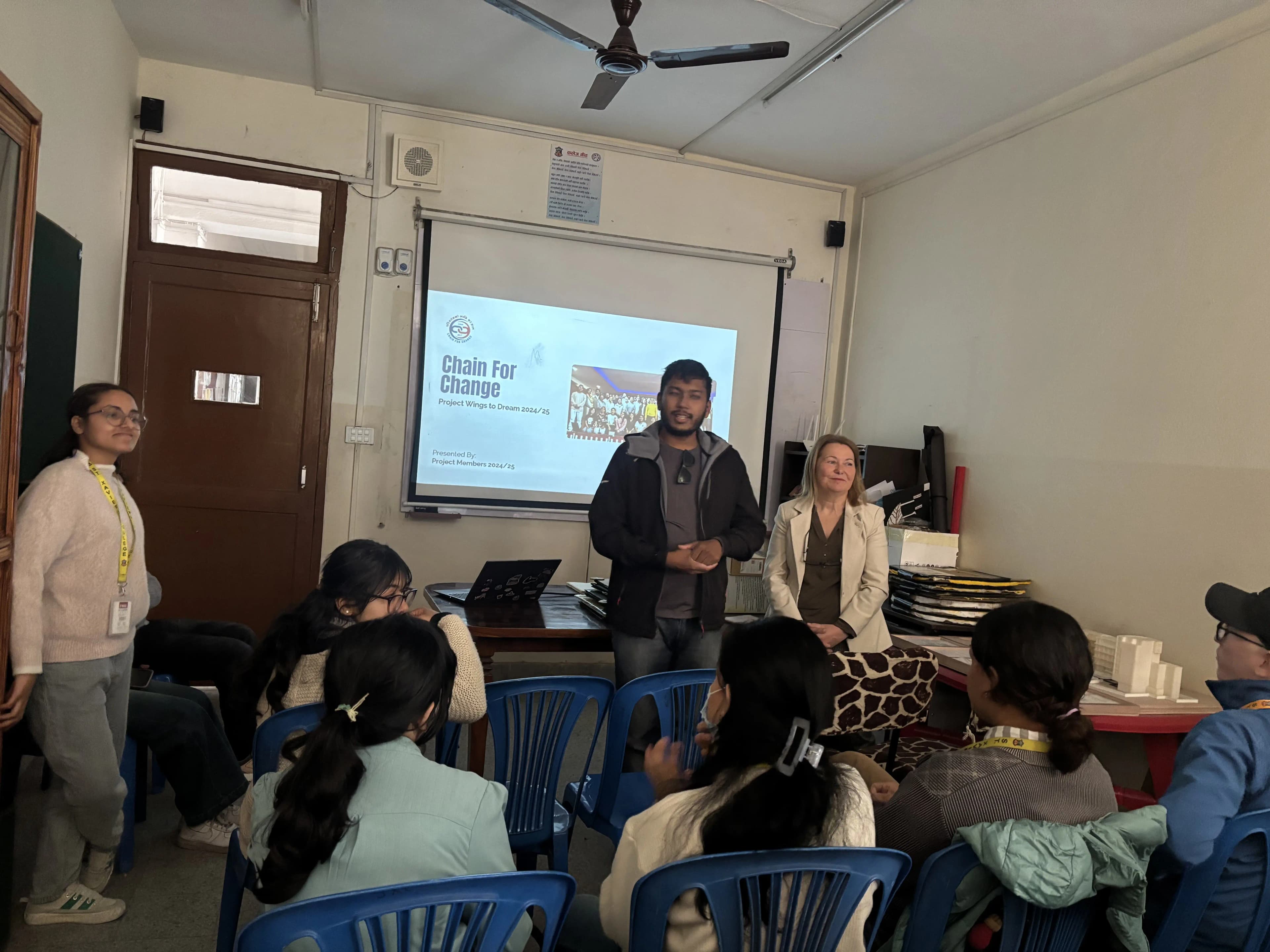 A picture where our Founder & President, Abhishek Shahi is addressing the event. On his left, Ana our exchange staff and on his right, one of the project members Aachal Bhatta is seen.