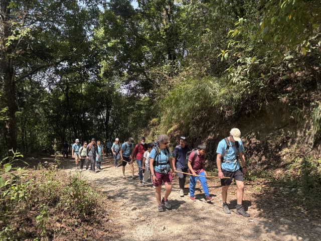 All the groups are hiking using the traditional Spanish style of guiding persons with visual disabilities in the mountain.