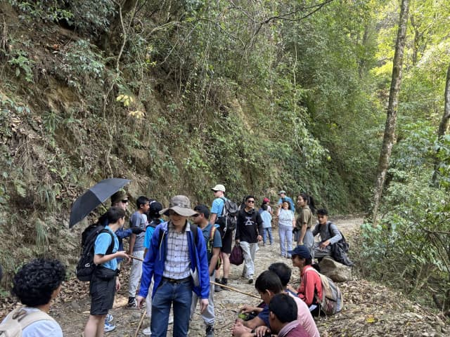 All the fellow hikers are resting and enjoying together.