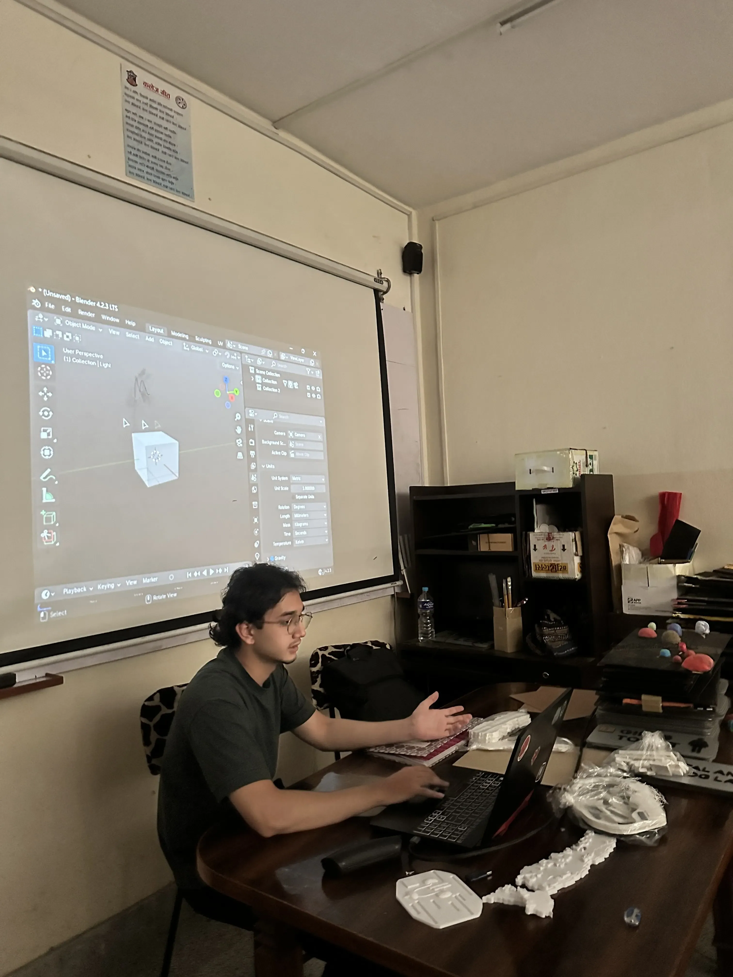 Lead of Computer Department (2024/25) Mr. Supreme Khadka is facilitating a session and a cuboid is projected.