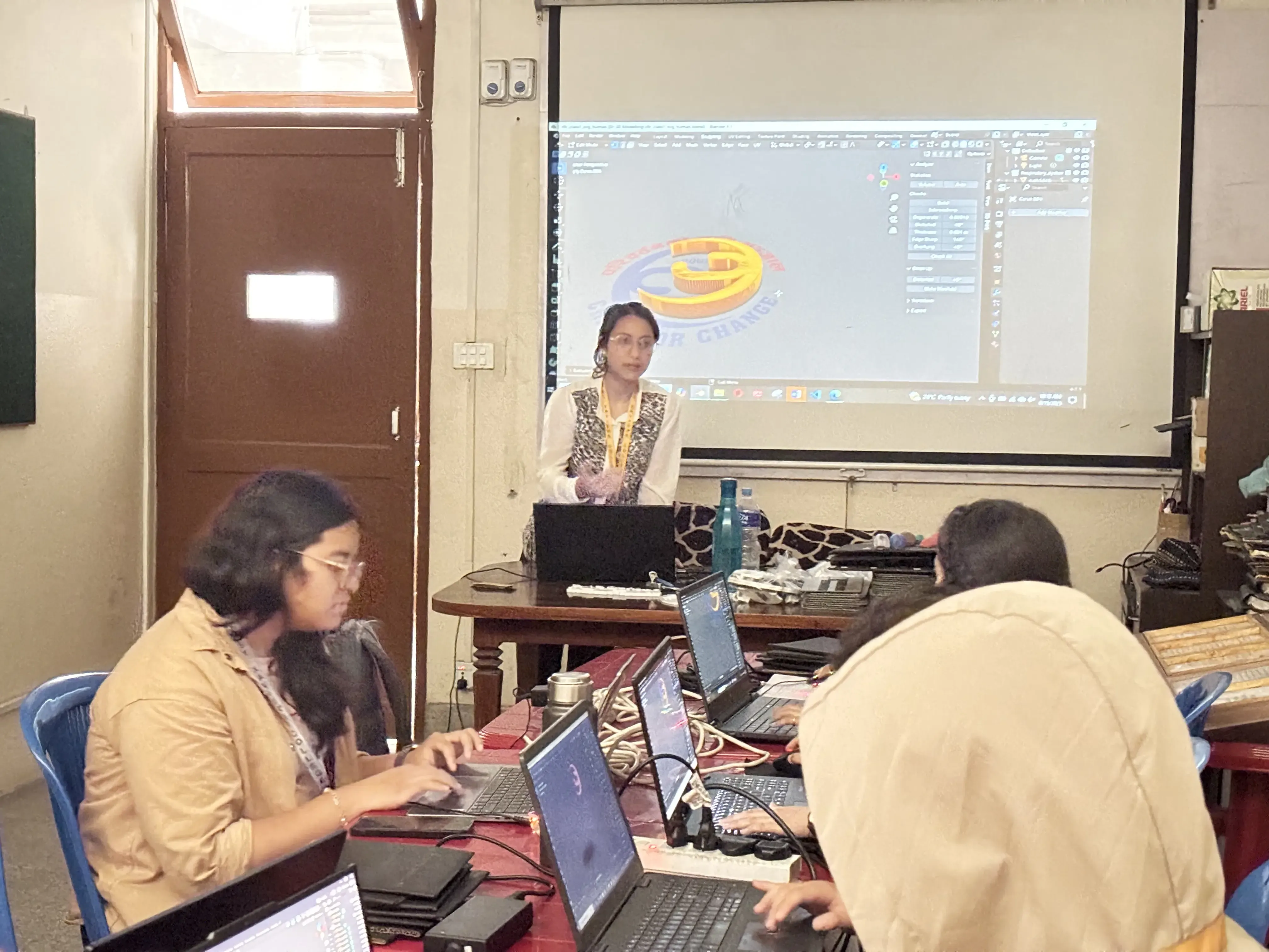 One of the members from Computer Department, Ms. Smriti Panta is facilitating the session and the logo of CFC is being projected. Also 3 of the new project members who are participating for this session is also observed.