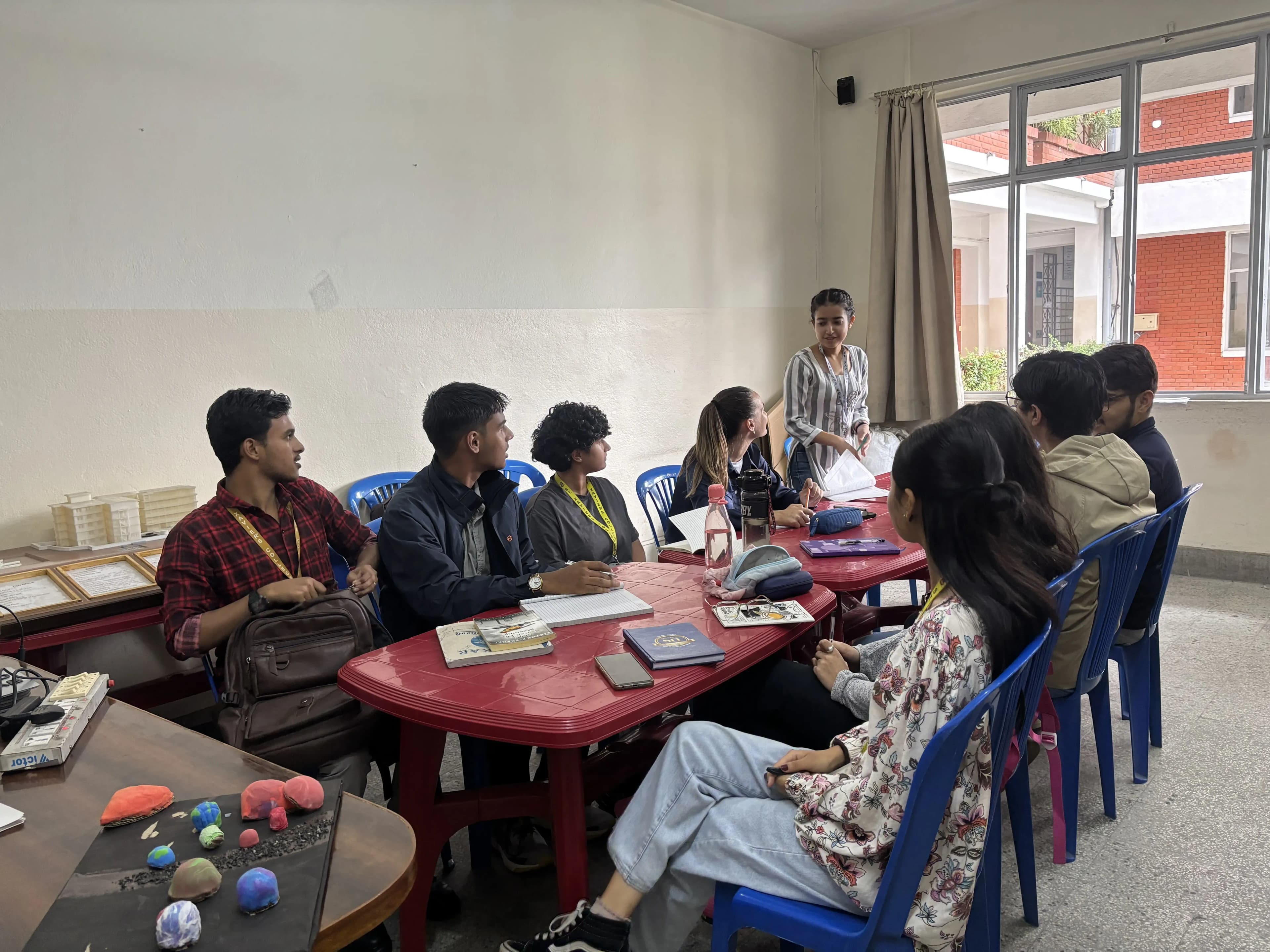 One of the project members (2025/26), Ms. Arpana Basnet is giving her introduction. There are 9 other participants listening to her.