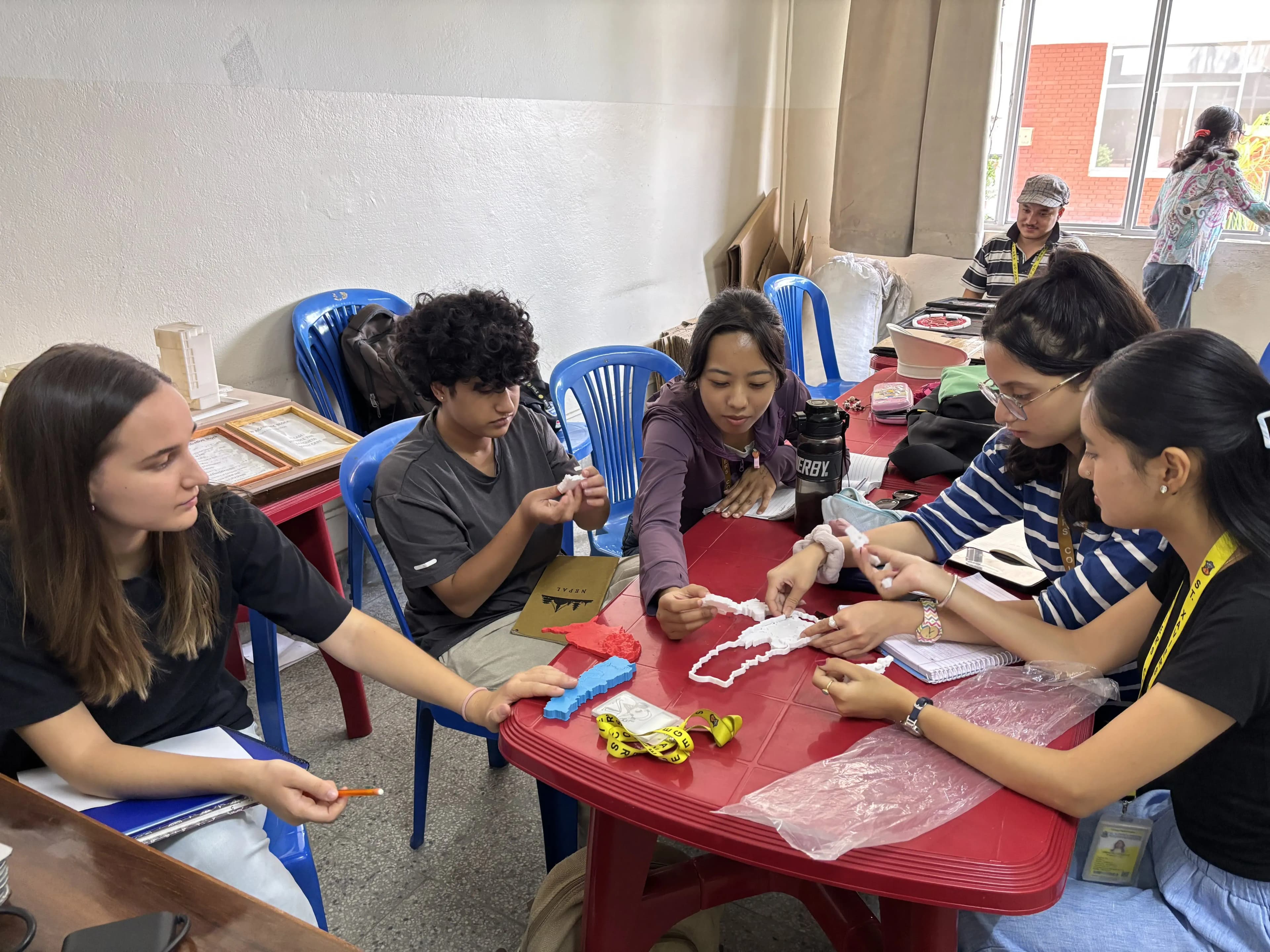 Participants of the workshop are exploring the 3D models of Map of Nepal.