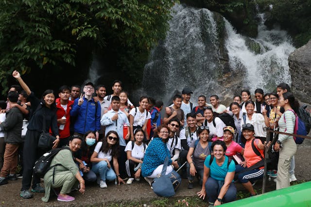 Group picture infront of waterfall of all the participants with visual disabilities, their guides, teachers of Laboratory School, Photographers Shaan Baidya & Praphulla Lal Shrestha, Videographer Subi Blon, Fanny Collado the president of Expedición Solidaria and organizational members of CFC.