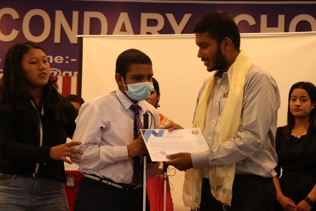 Awarding certificate to the participant with visual disability by Founder & Director of Chain For Change Mr. Abhishek Shahi.
