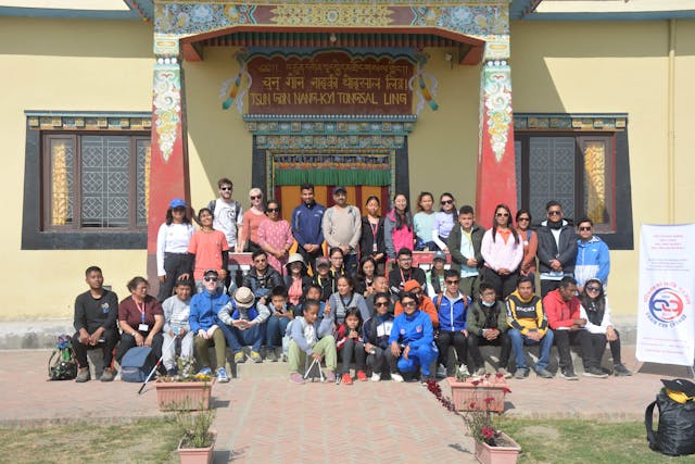 A group picture of around 44 people including Dr. Cristina Gomez Vicente and Dr. Guillermo Rodriguez Cortes representing Expedición Solidaria, Fr. Jiju Varghese, S.J – Superior and Director of International Relation of St. Xavier's College, 17 persons with visual disabilities, their guides, teachers from Laboratory Secondary School, parents/guardians, and CFC members.